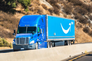 Nov 10, 2019 Hollister / CA / USA - Amazon truck driving on the freeway; the large Prime logo printed on the side
